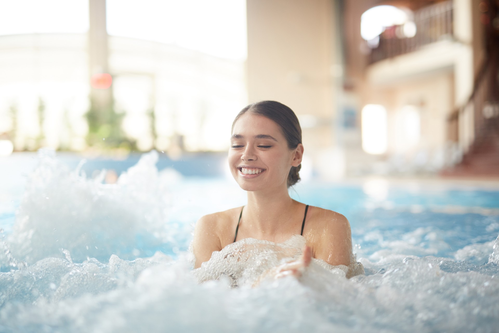 Beautiful Woman Enjoying Bubbly Hot Tub